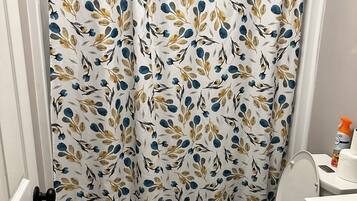 Shower, towels, toilet paper