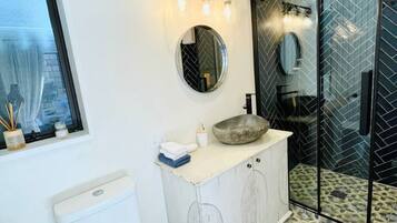Shower, eco-friendly toiletries, hair dryer, towels