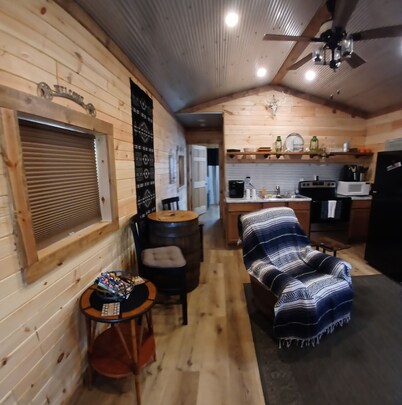 Cozy tiny cabin, close to local activities. Pet friendly. Suited 2 adults.
