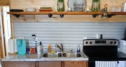 Cozy tiny cabin, close to local activities. Pet friendly. Suited 2 adults.
