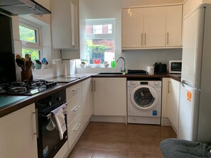 Fridge, microwave, oven, stovetop - Beautifully Styled 2BR Home with Garden (Manchester)