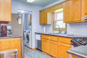 Fridge, microwave, stovetop, dishwasher - Dog-Friendly Michigan Home w/ Deck & Fire Pit! (Central Lake)