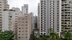 A high-rise residential building with multiple balconies and a central courtyard. - Ai78-902 in S o Paulo (São Paulo)
