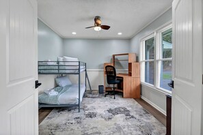 4 bedrooms, desk, iron/ironing board, travel cot