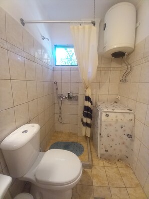 Hair dryer, bidet, towels, soap