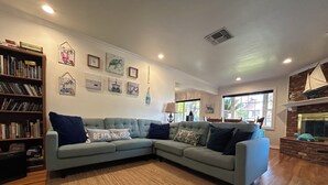 Smart TV, fireplace, DVD player, books