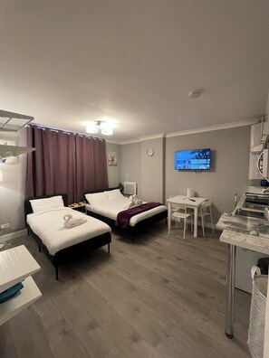 Classic Studio | Frette Italian sheets, premium bedding, blackout drapes