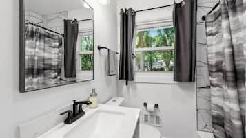 Hair dryer, towels, soap, shampoo