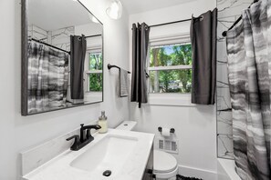 Hair dryer, towels, soap, shampoo