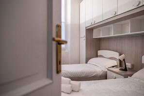 2 habitaciones, tabla de planchar con plancha, wifi y ropa de cama 