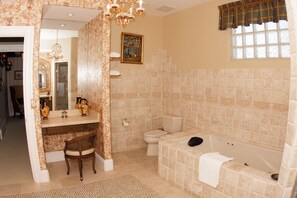 Shower, jetted tub, hair dryer, towels