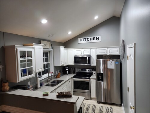 Cozy 3BR w/ Fenced Yard, Porch & Easy City Access- Pets Welcome!