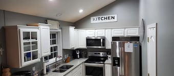 Cozy 3BR w/ Fenced Yard, Porch & Easy City Access- Pets Welcome!