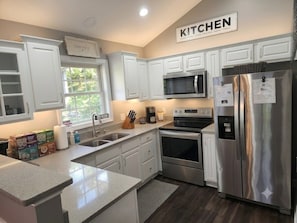 Coffee/tea maker, fridge, microwave, oven - Cozy 3BR w/ Fenced Yard, Porch & Easy City Access- Pets Welcome! (Graham)
