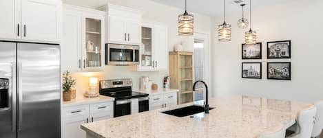 Fridge, microwave, dishwasher, coffee/tea maker
