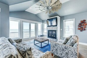 TV, fireplace - Beach Spray | Oceanfront | Private Pool and Hot Tub (Duck)