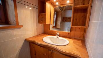 Regadera y secadora de cabello