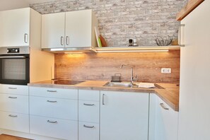 Refrigerador, microondas, horno y lavavajillas 