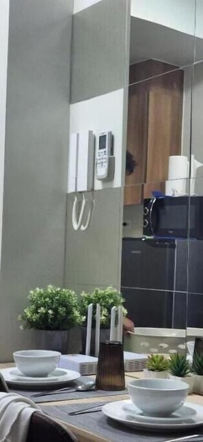 Fridge, microwave, electric kettle, cookware/dishes/utensils