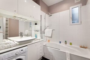 Hair dryer, towels, soap, shampoo