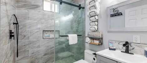 Shower, hair dryer, towels, soap