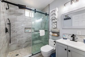 Shower, hair dryer, towels, soap