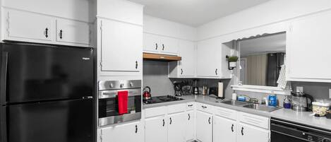 Fridge, microwave, coffee/tea maker, toaster