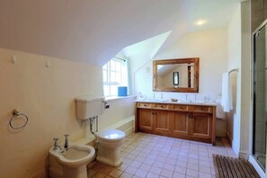 Shower, hair dryer, towels, shampoo
