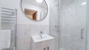 Shower, hair dryer, shampoo