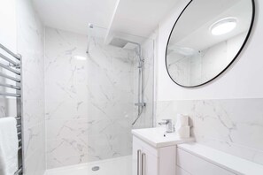 Shower, hair dryer, shampoo