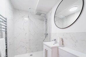 Shower, hair dryer, shampoo