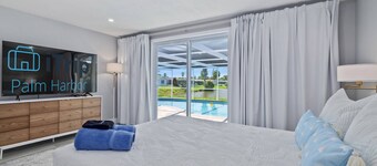 Luxury 3BR Home w/ Heated Pool, Outdoor TV, Bikes & BBQ – Perfect for Families with Modern Kitchen!