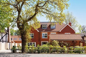 The home is set along a leafy suburban area north of Chichester. - Luxury Chichester Home for 12 (West Sussex)