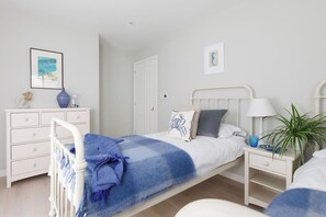 4 bedrooms, desk, iron/ironing board, travel crib