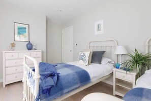 4 bedrooms, desk, iron/ironing board, travel cot