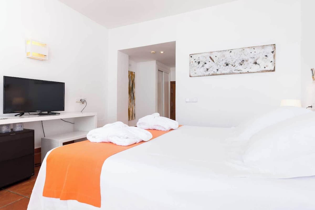 1 habitación, minibar y caja de seguridad en la habitación