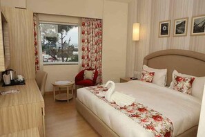 Chambre Deluxe | Coin séjour | Télévision