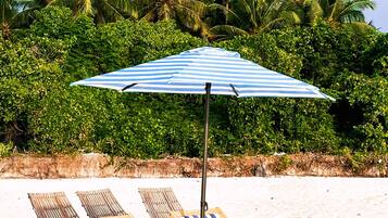Private beach, white sand, beach umbrellas