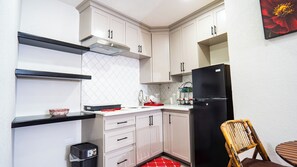 Fridge, microwave, stovetop, coffee/tea maker