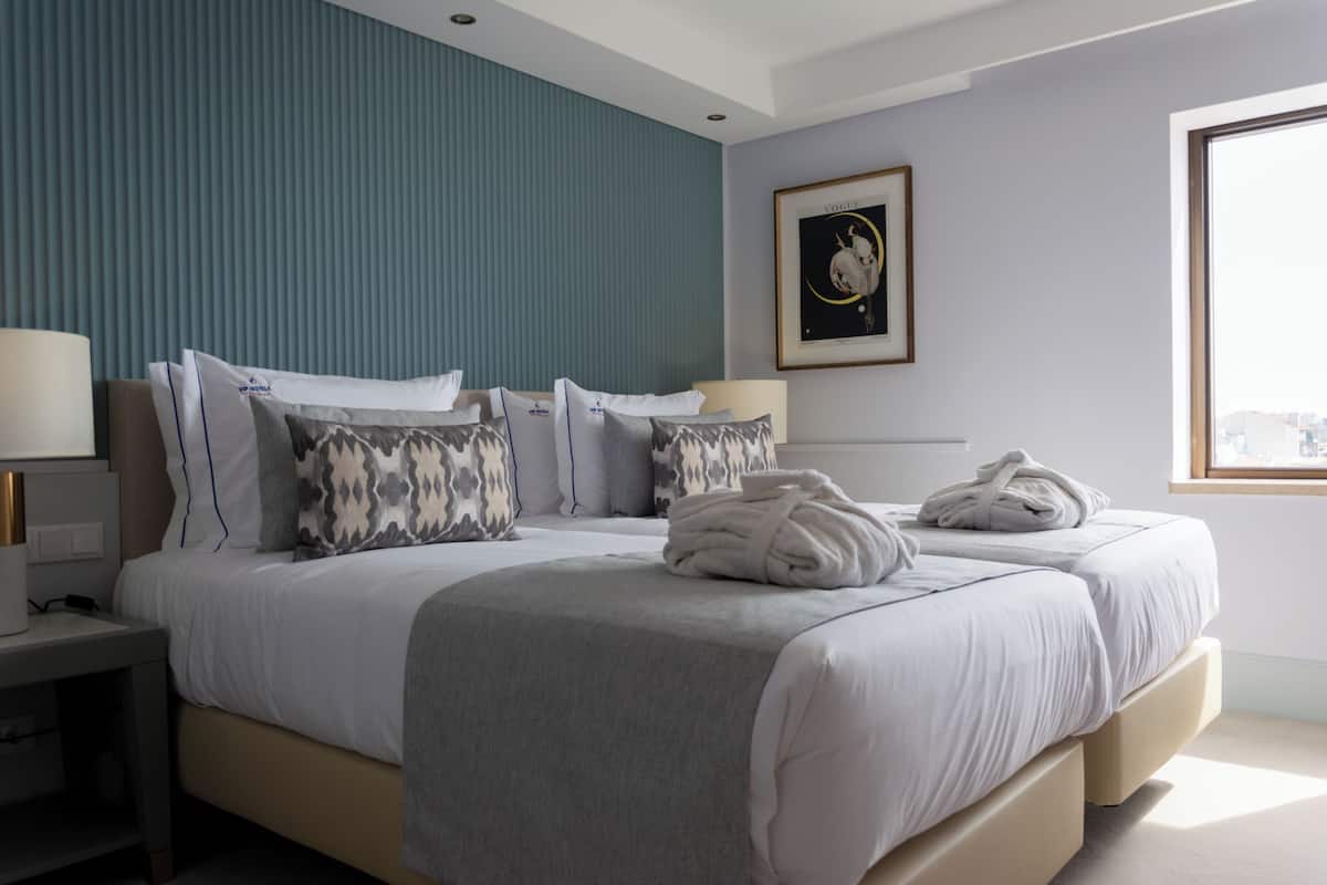 Desk, laptop workspace, free WiFi, bed sheets