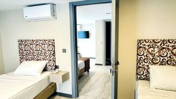 Appartamento City, letti multipli, non fumatori, vista città | 1 camera, minibar, una scrivania, postazione laptop