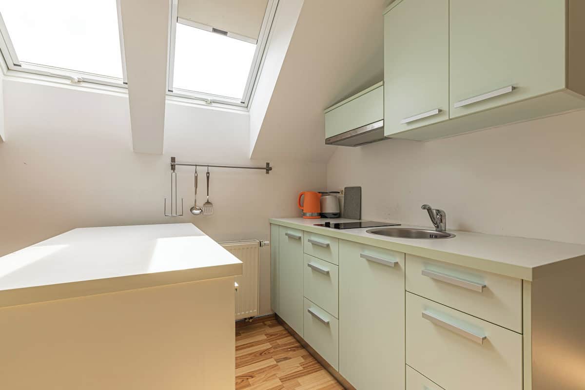 Fridge, stovetop, electric kettle, toaster