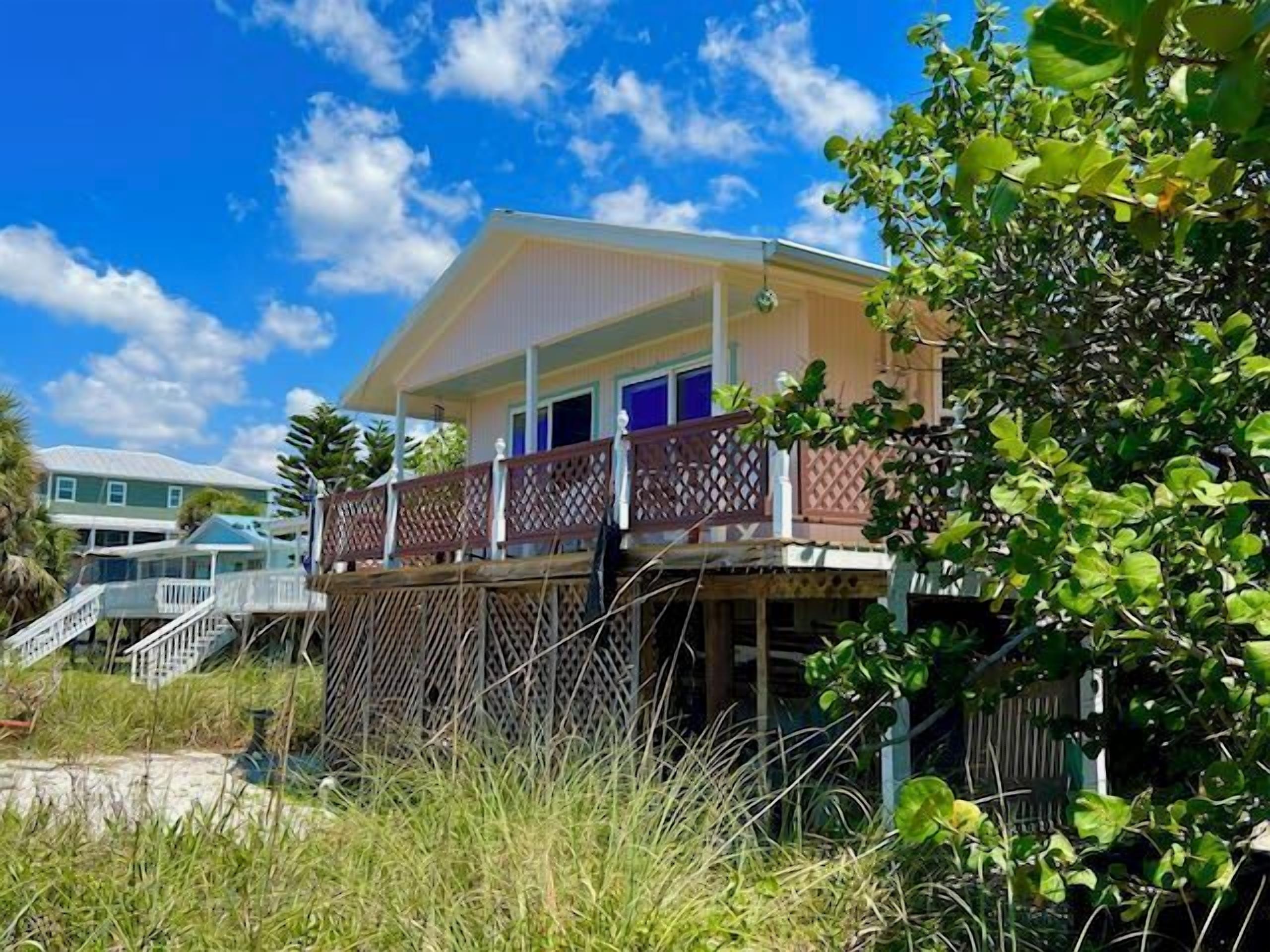 A Sunset Cottage- Beachfront with private dock