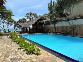 Outdoor pool, pool umbrellas, sun loungers