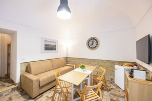 デラックス アパートメント | リビング エリア | 薄型テレビ