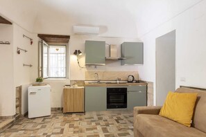 Appartement Deluxe | Aire de séjour | Téléviseur à écran plat