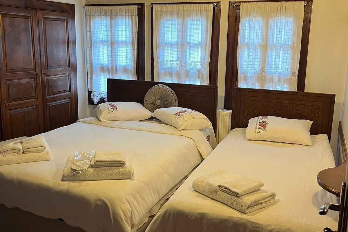 Family Triple Room, City View | Free WiFi, bed sheets