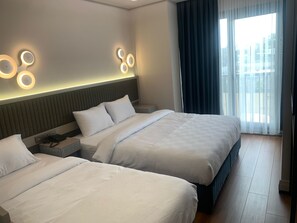 Estudio estándar | Ropa de cama de alta calidad, camas Select Comfort y minibar