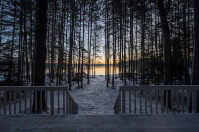 Porch in the Pines | Lakefront home w/ AC! Sandy Beach, Dock, Dogs OK