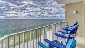 A balcony with a view of the ocean and beach. - Popular Escape in a Private Paradise (Panama City Beach)